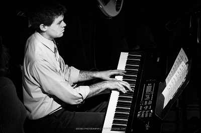 Greg Santa Croce playing the piano
